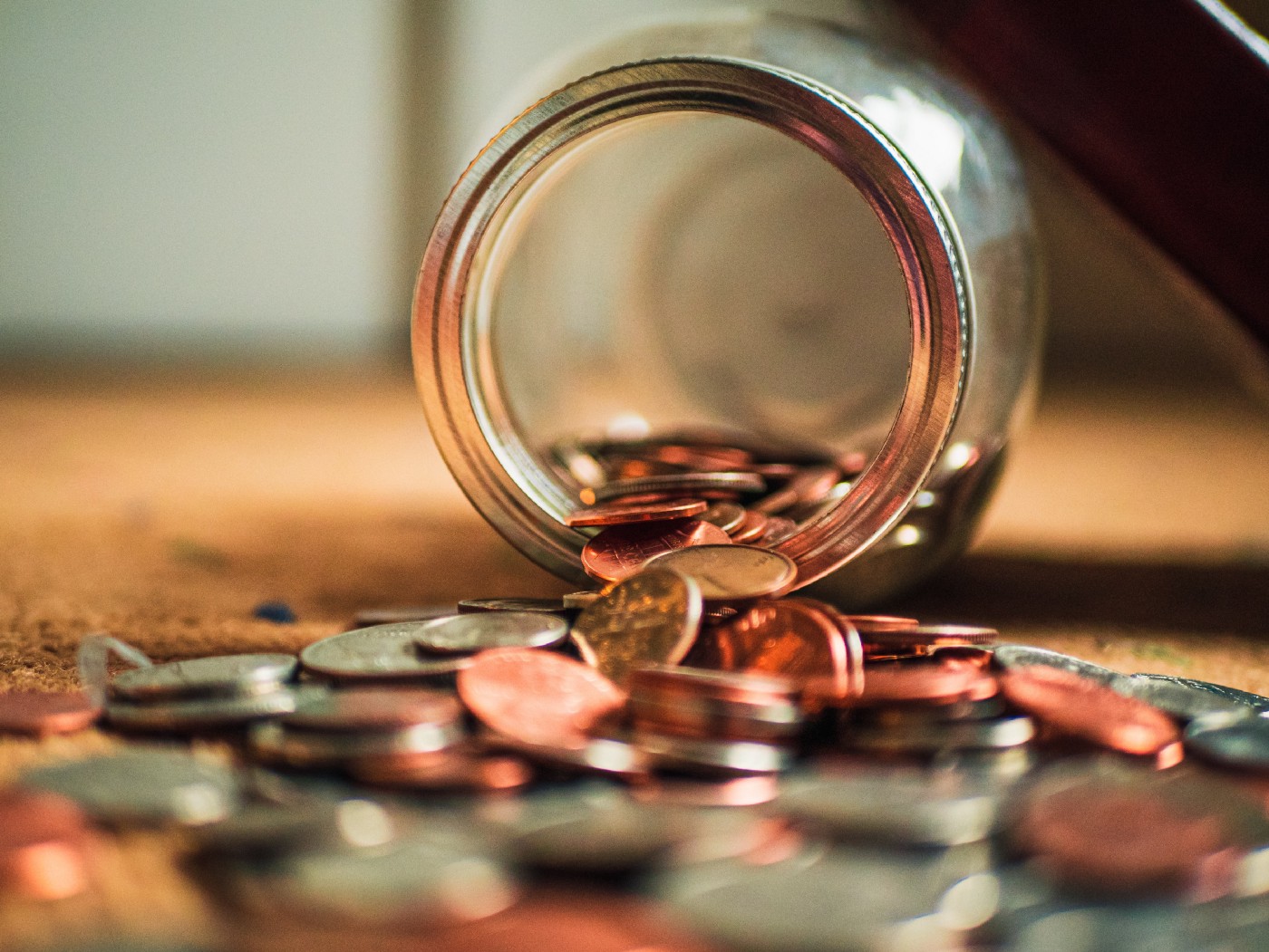 Coins coming out from a pot