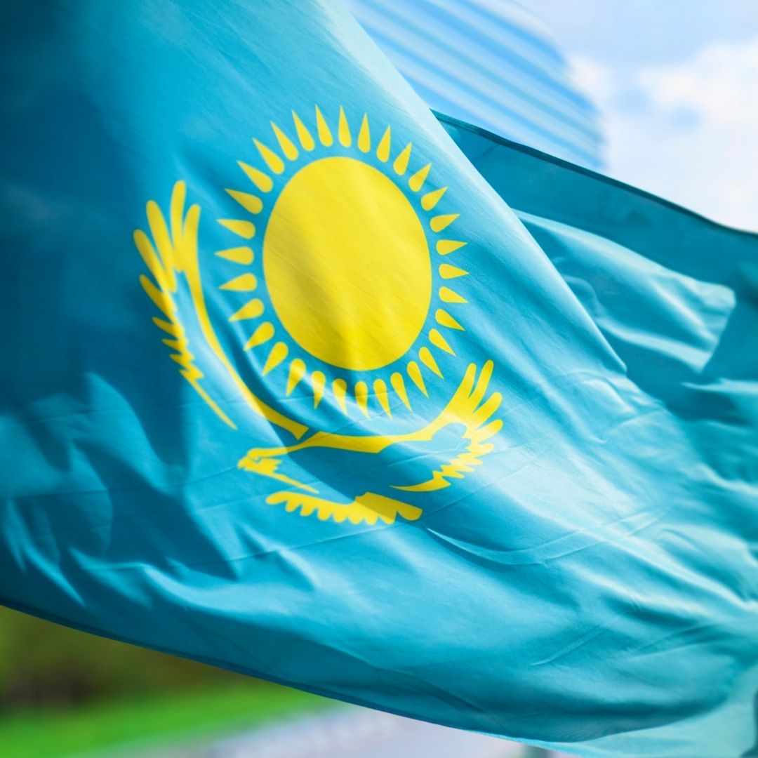 The flag of Kazakhstan flies